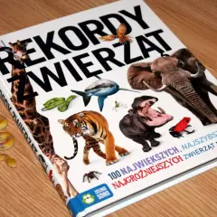 Książka "Rekordy zwierząt" z ilustracjami słonia, hipopotama, tygrysa, rekina i innych. Odkryj rekordy guinessa zwierząt!